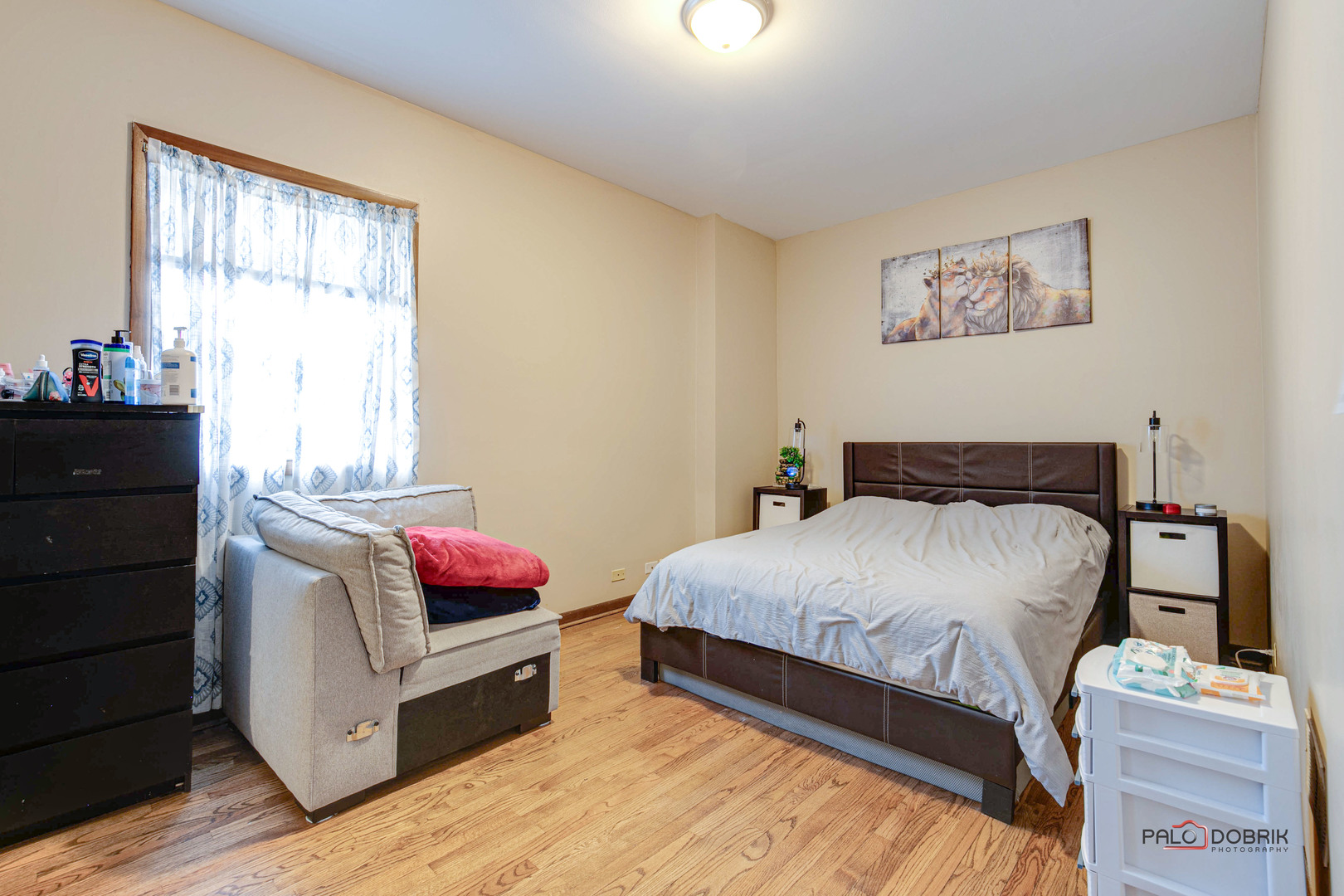 47 Prairie Avenue, Unit 1 Highwood, IL 60040 - Photo 15 of 20 a bedroom with a bed and a window