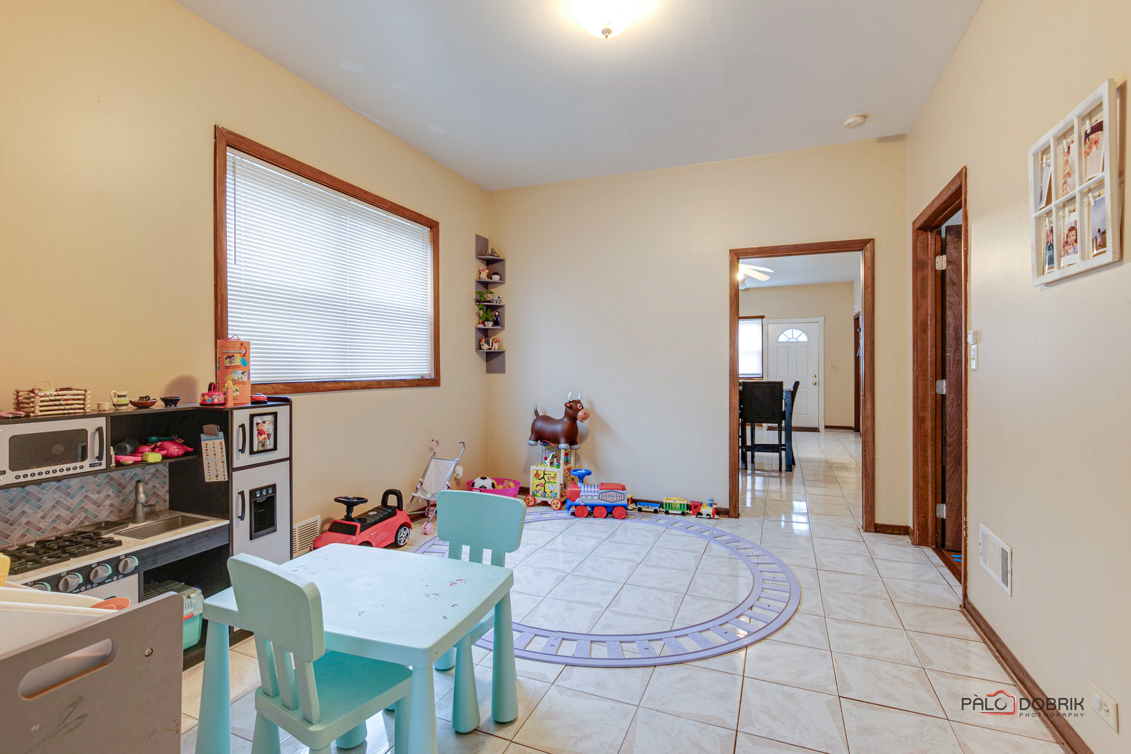 47 Prairie Avenue, Unit 1 Highwood, IL 60040 - Photo 8 of 20 a living room with furniture and a wooden floor