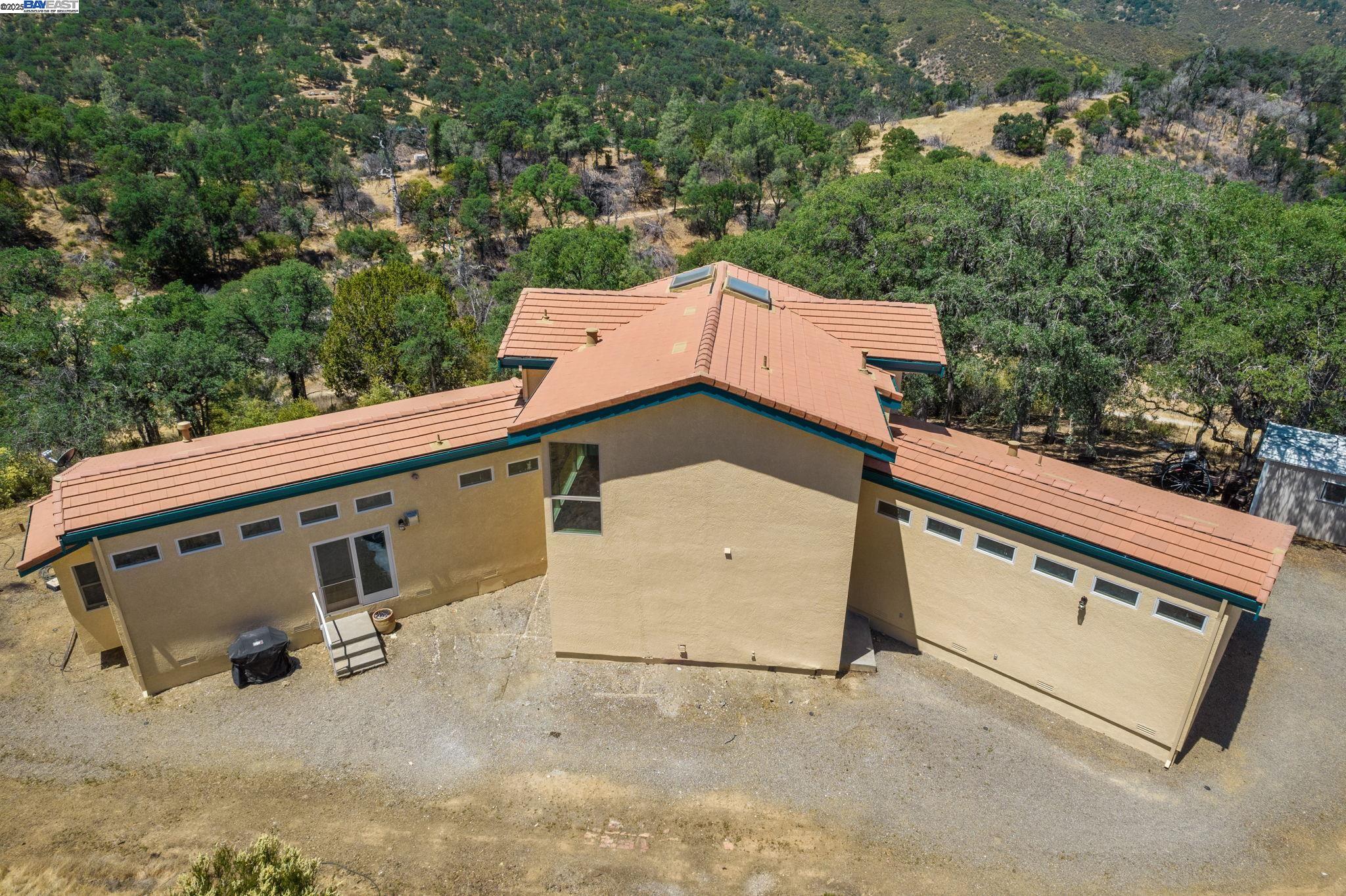 59480 Mines Road Livermore, CA 94550 - Photo 13 of 44 Back of house including glassed balcony upstairs