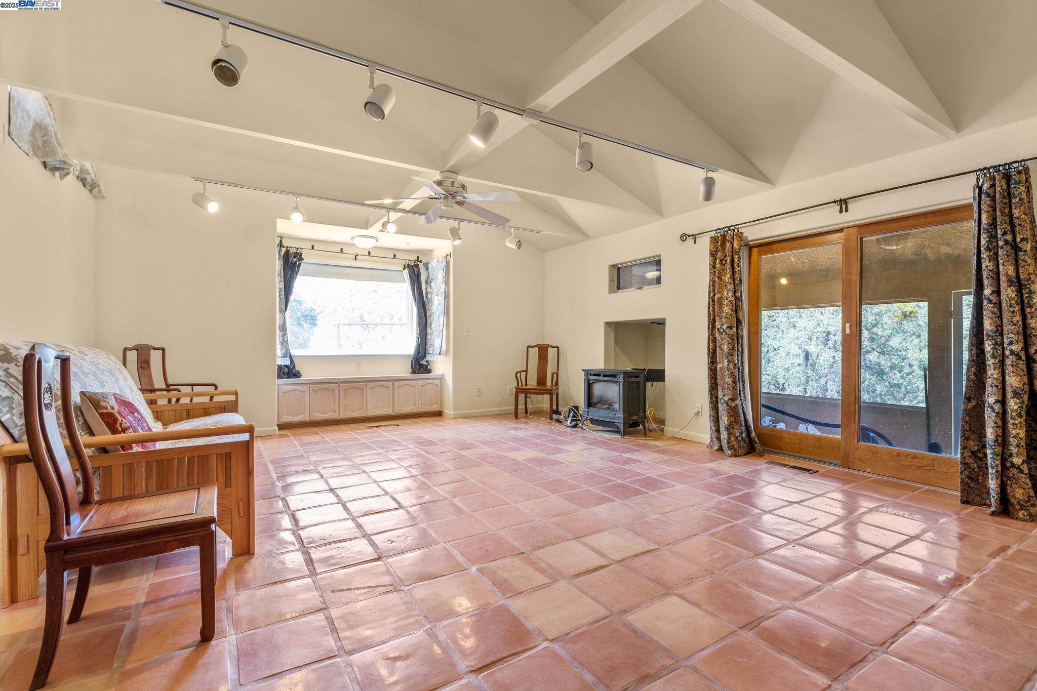 59480 Mines Road Livermore, CA 94550 - Photo 17 of 44 Living room/dining area, large end window and storage cabinets
