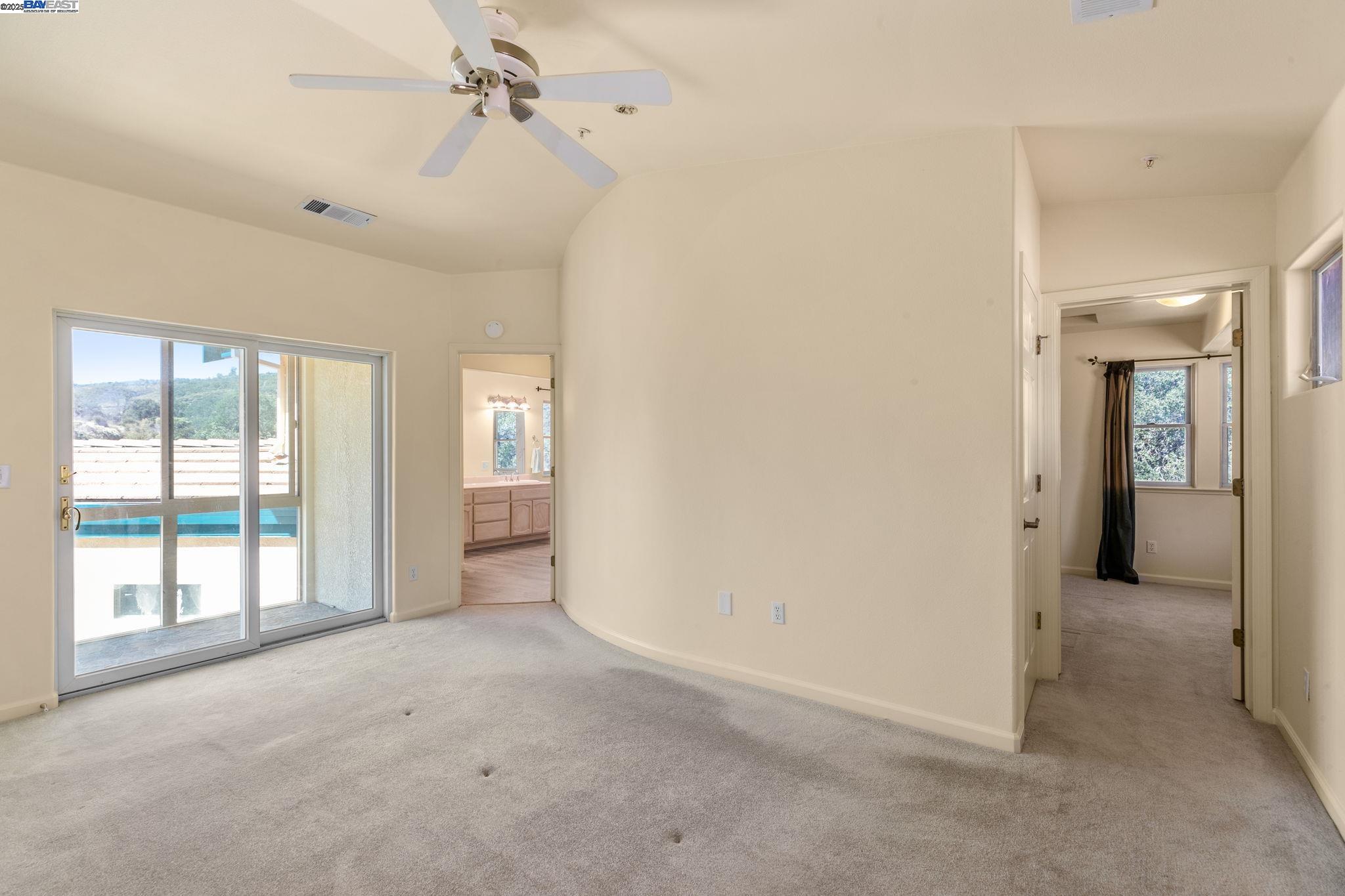 59480 Mines Road Livermore, CA 94550 - Photo 27 of 44 Primary bedroom with office room, primary bath and glassed balcony