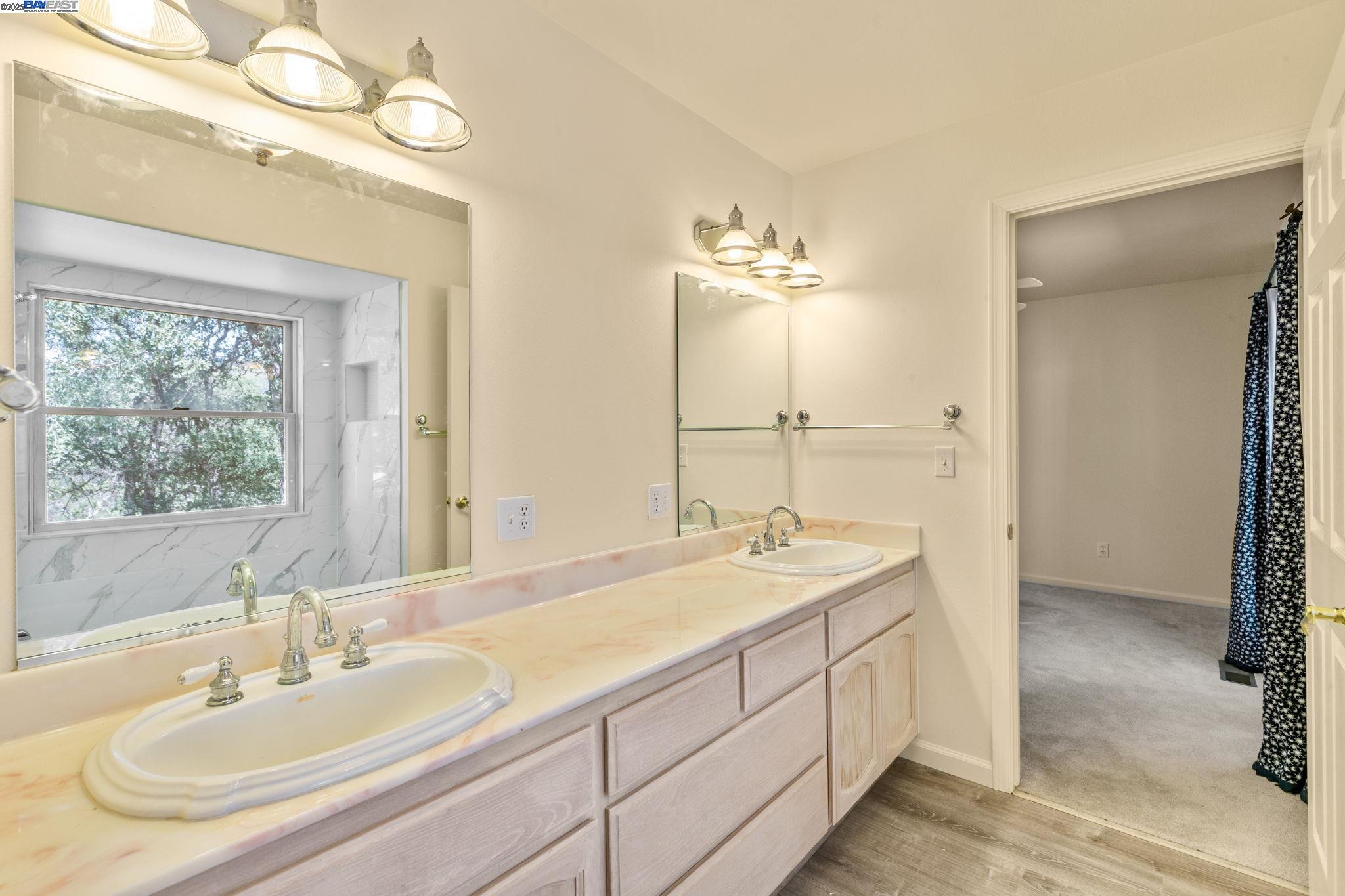 59480 Mines Road Livermore, CA 94550 - Photo 35 of 44 Downstairs bath between two bedroom, two sinks