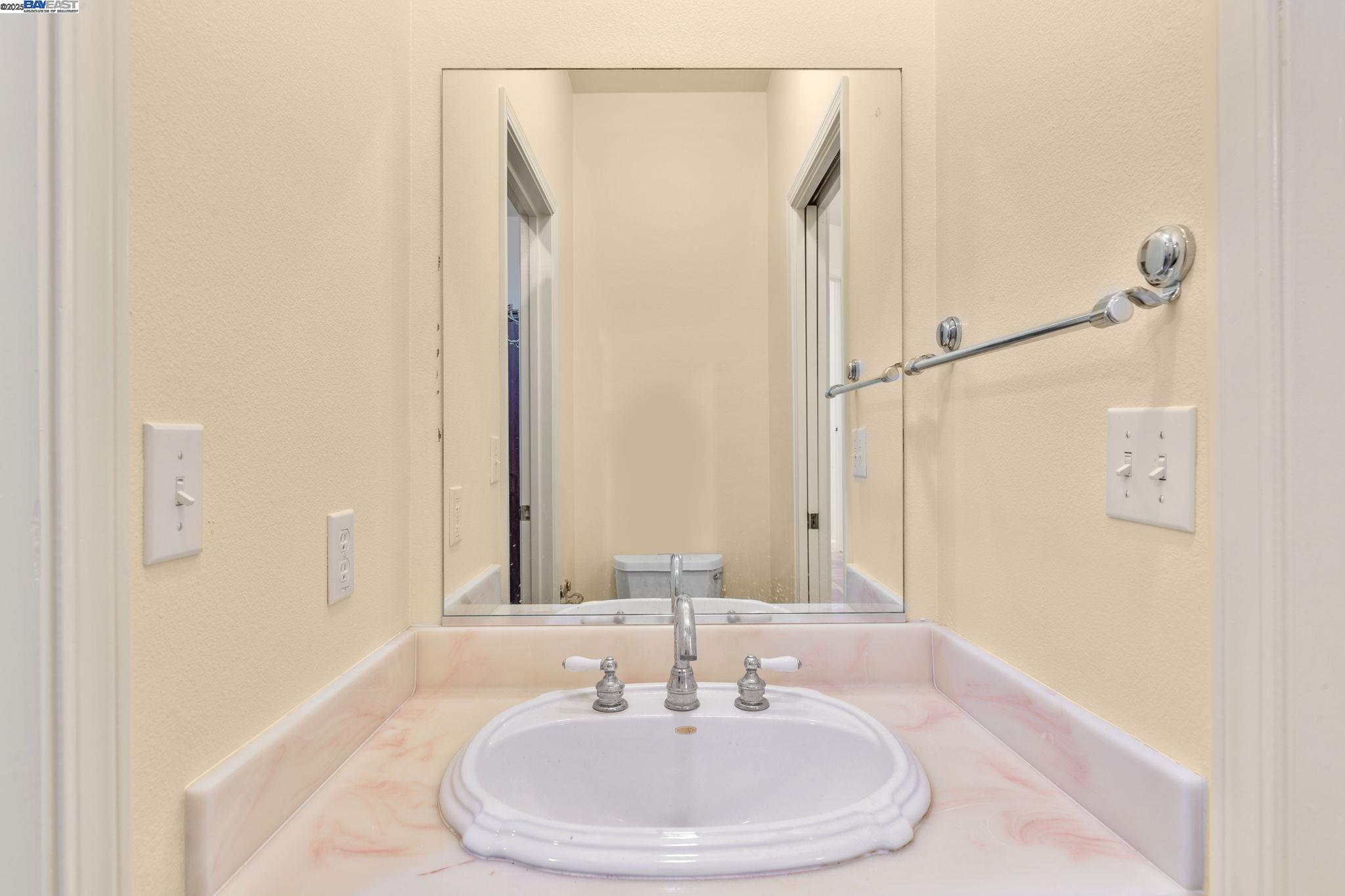 59480 Mines Road Livermore, CA 94550 - Photo 41 of 44 1/2 bath sink, adjacent to pantry/ mudroom