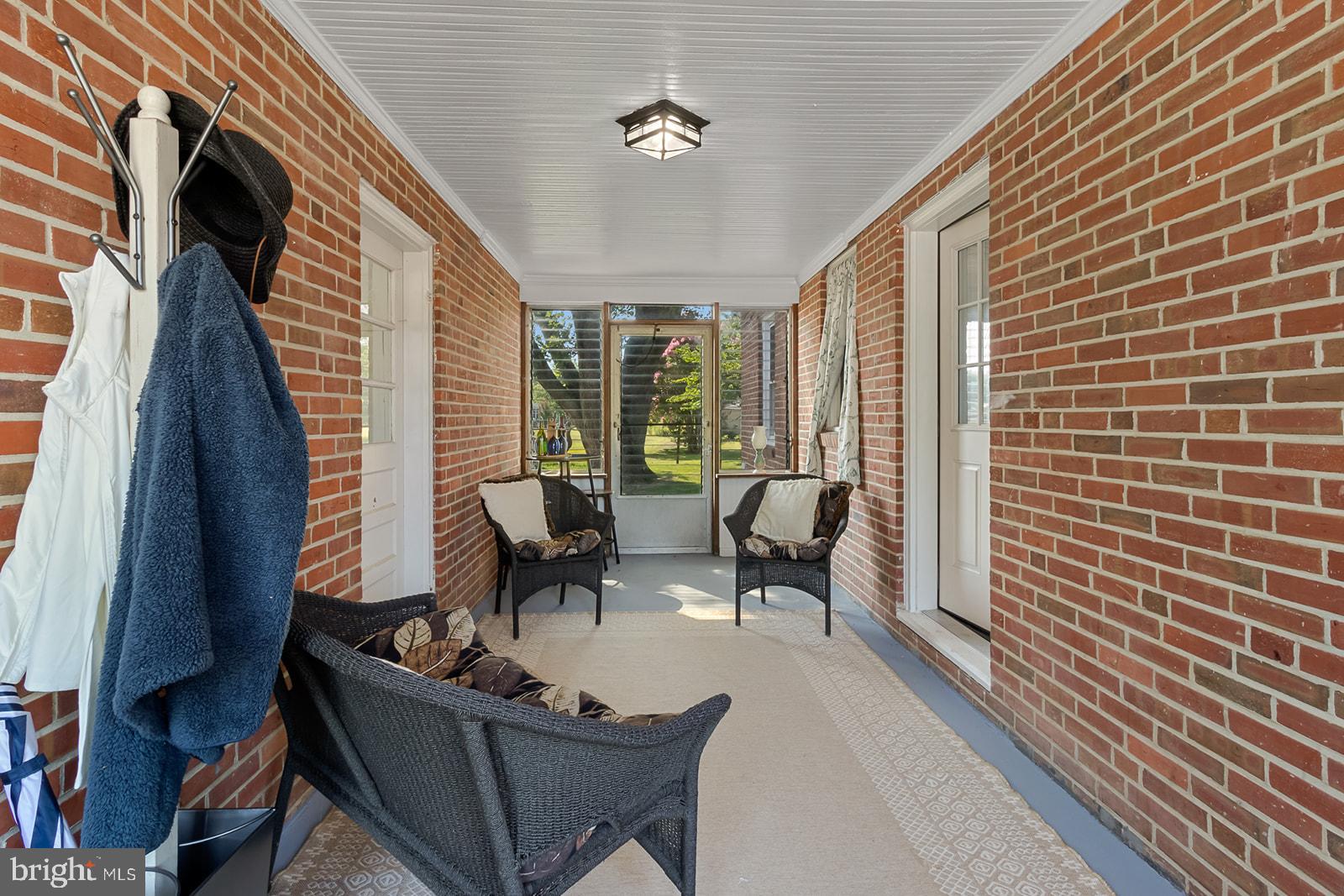 52 Lake Road Lottsburg, VA 22511 - Photo 26 of 42 3 season breezeway from garage to kitchen