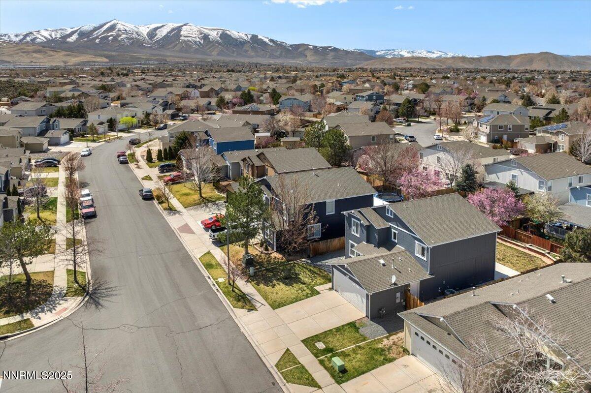 7753 Tulear Street Reno, NV 89506 - Photo 2 of 38 an aerial view of a house with a mountain