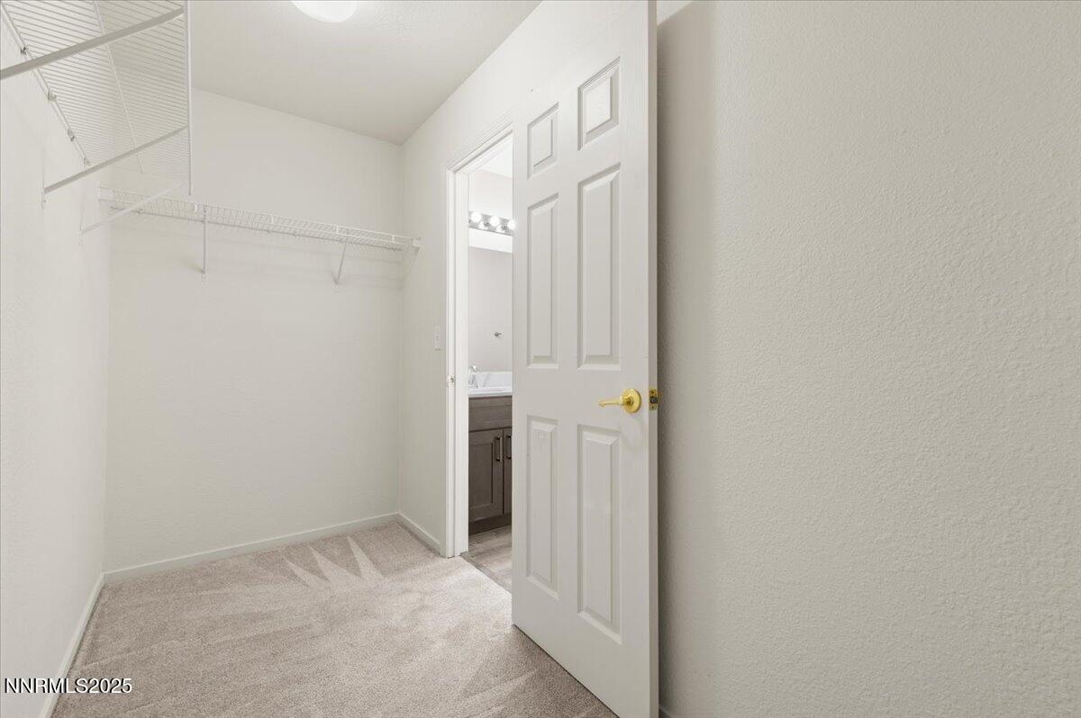 7753 Tulear Street Reno, NV 89506 - Photo 25 of 38 a view of closet area