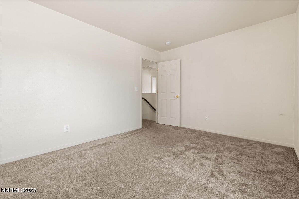 7753 Tulear Street Reno, NV 89506 - Photo 27 of 38 a view of an empty room