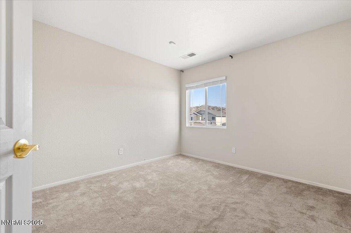 7753 Tulear Street Reno, NV 89506 - Photo 28 of 38 a view of an empty room
