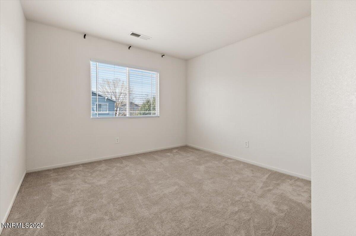 7753 Tulear Street Reno, NV 89506 - Photo 30 of 38 an empty room with windows