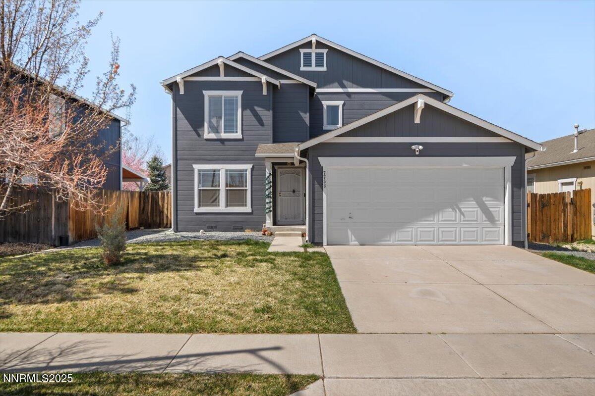 7753 Tulear Street Reno, NV 89506 - Photo 3 of 38 a front view of a house with garden