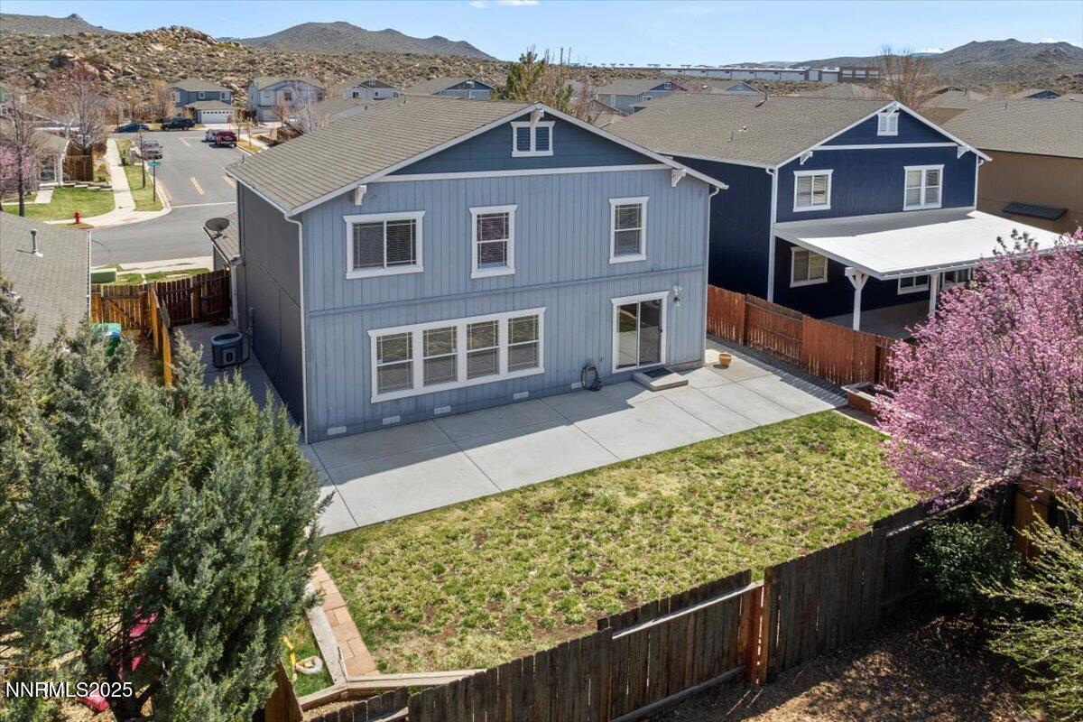 7753 Tulear Street Reno, NV 89506 - Photo 37 of 38 an aerial view of a house with a yard