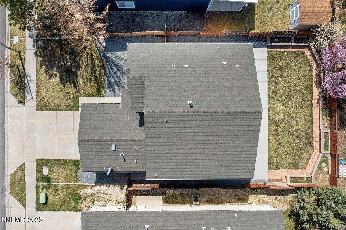 7753 Tulear Street Reno, NV 89506 - Photo 38 of 38 an aerial view of a house with a yard