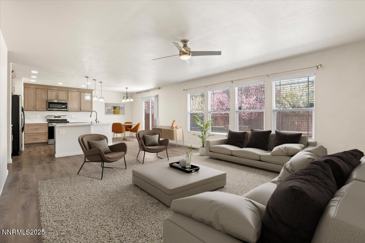 7753 Tulear Street Reno, NV 89506 - Photo 5 of 38 a living room with furniture and a large window