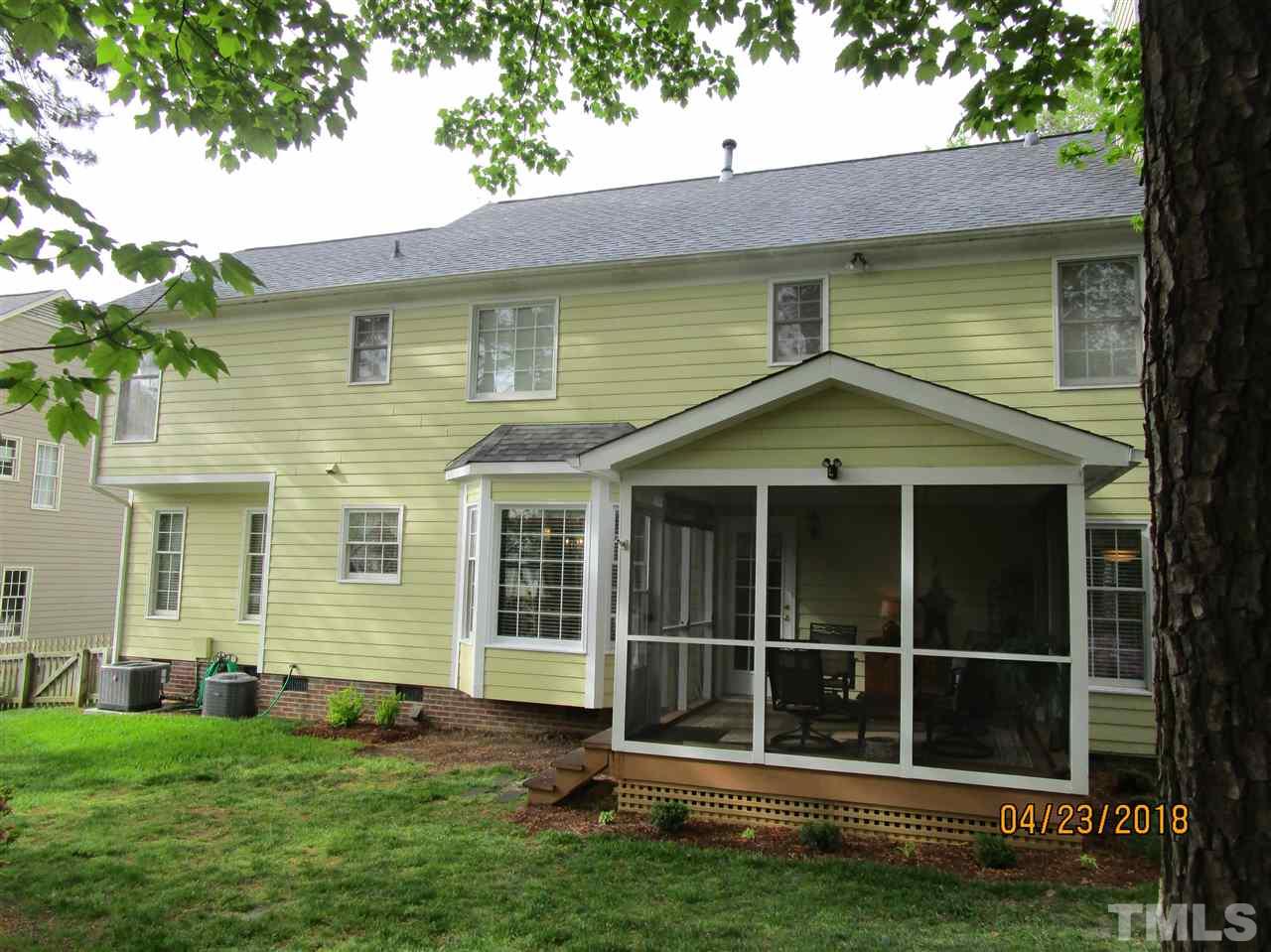 5629 Raddington Street Raleigh, NC 27613 - Photo 3 of 23 a view of a house with a yard