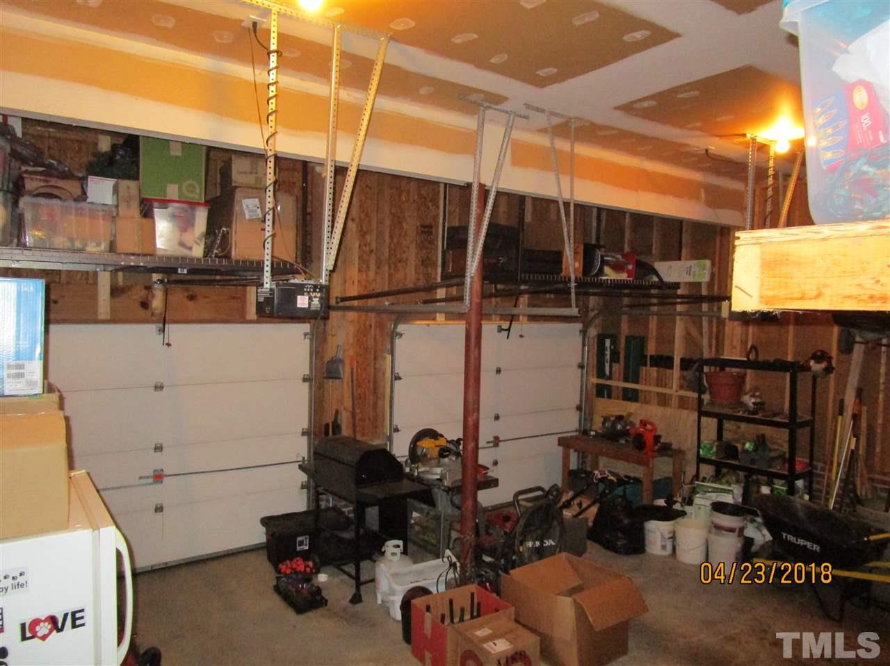 5629 Raddington Street Raleigh, NC 27613 - Photo 22 of 23 a view of storage and utility room