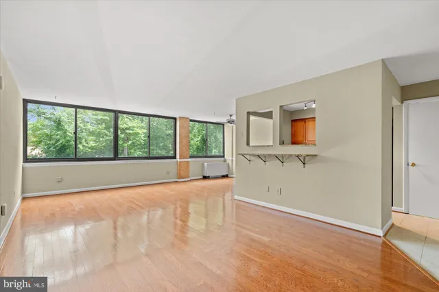 a view of an empty room with a window