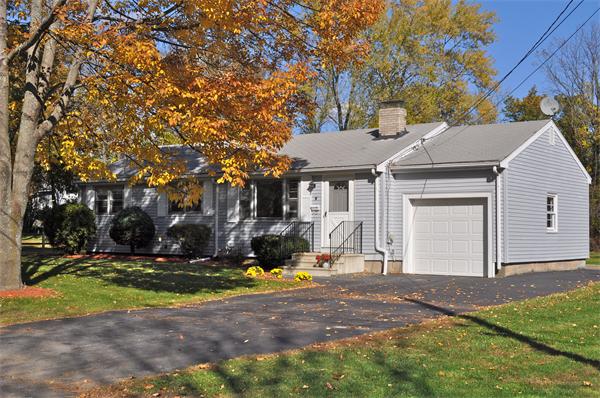 8 Wesson Road Ashland, MA 01721 - Photo 8 of 23 a view of a white house with a yard and large tree