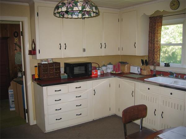 274 Bailey Road Holden, MA 01520 - Photo 6 of 9 a kitchen with stainless steel appliances a cabinets and a window
