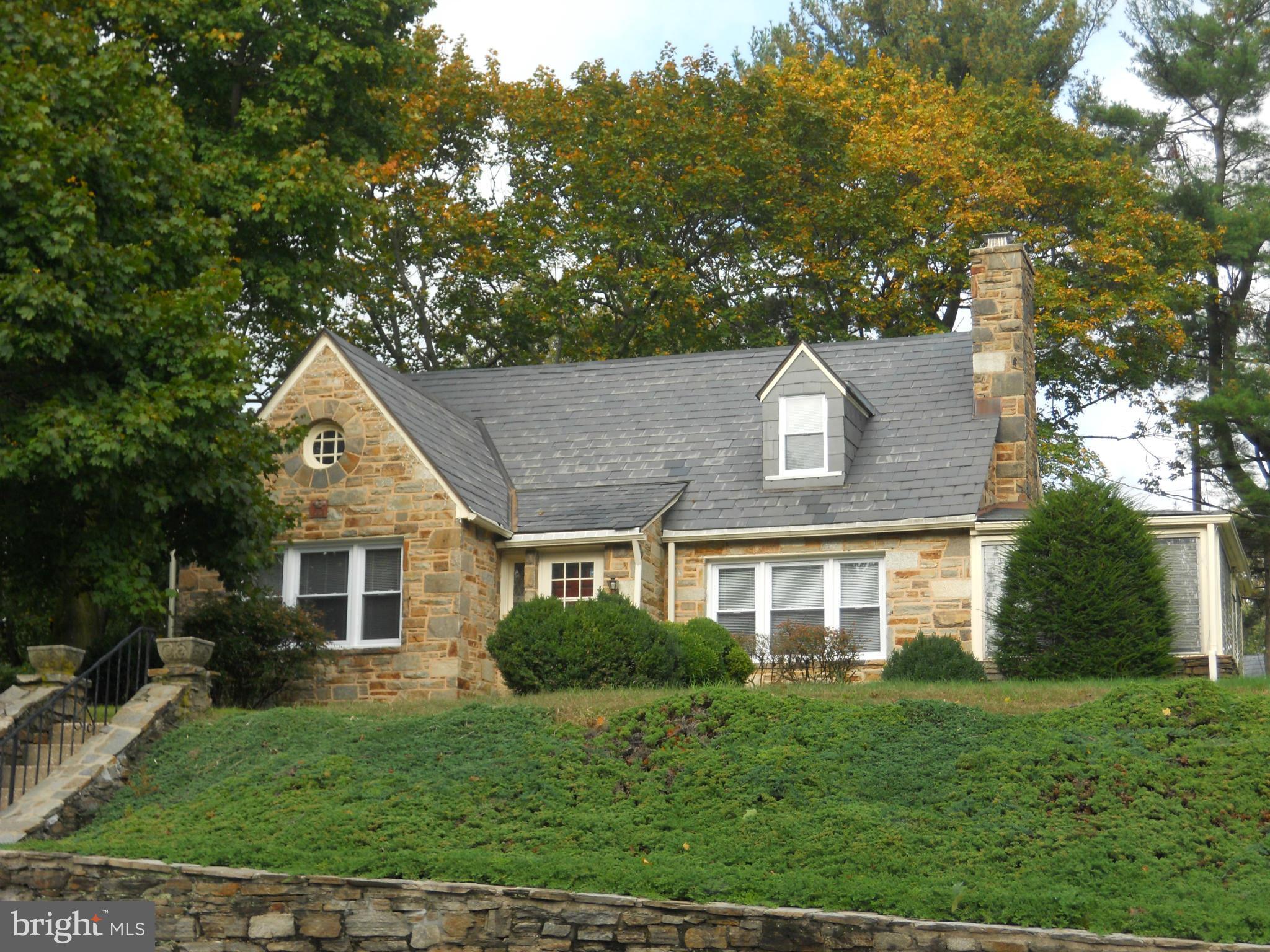 7311 Knollwood Road Baltimore, MD 21286 - Photo 1 of 30 a aerial view of a house next to a yard
