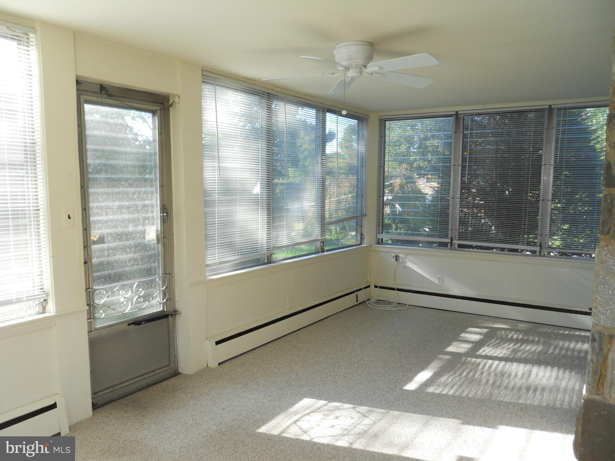 7311 Knollwood Road Baltimore, MD 21286 - Photo 11 of 30 a view of an empty room with a window