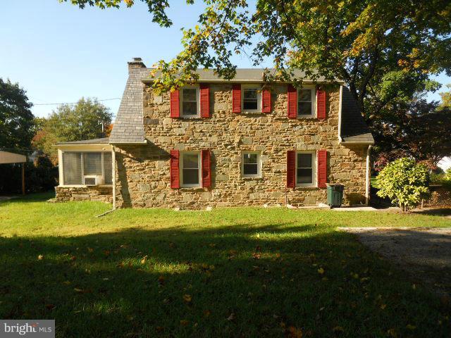 7311 Knollwood Road Baltimore, MD 21286 - Photo 29 of 30 a front view of a house with a garden