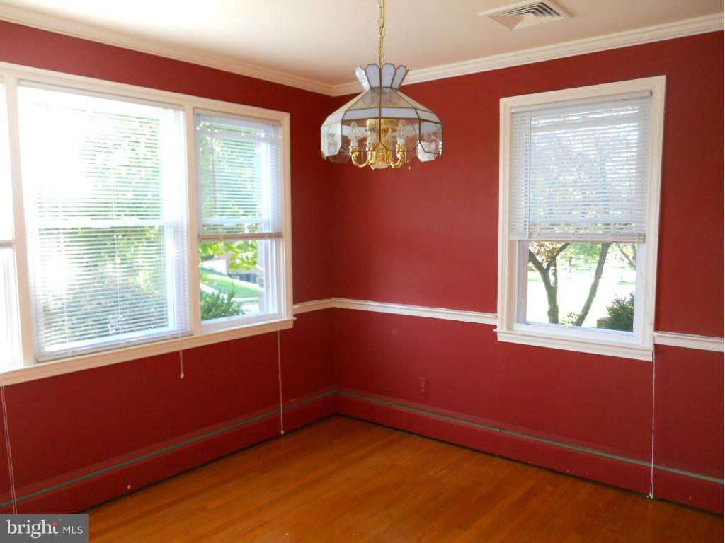 7311 Knollwood Road Baltimore, MD 21286 - Photo 6 of 30 a view of an empty room with a window