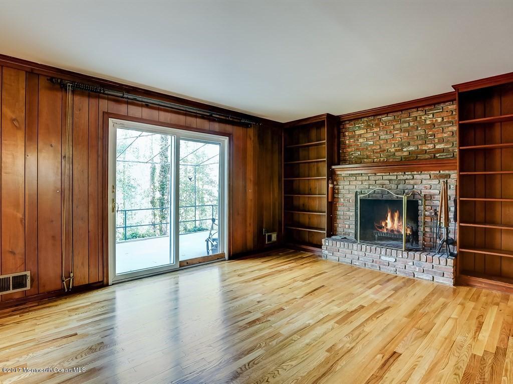 651 Valley Road Brielle, NJ 08730 - Photo 16 of 25 Den Complete w/ Woodburning Fireplace