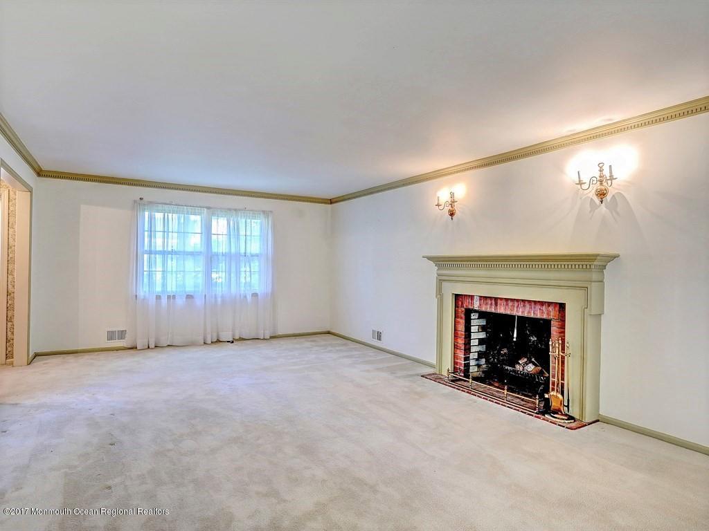 651 Valley Road Brielle, NJ 08730 - Photo 9 of 25 Living Room w/ Woodburning Fireplace