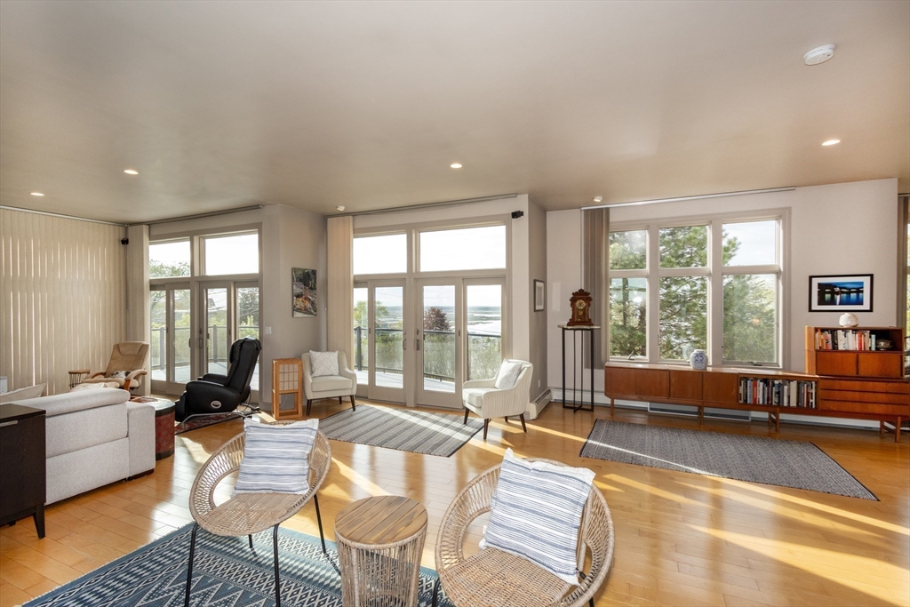 8 Goldfinch Way Ipswich, MA 01938 - Photo 21 of 41 a living room with furniture and large windows