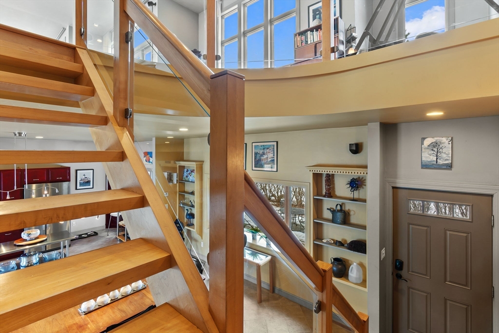 8 Goldfinch Way Ipswich, MA 01938 - Photo 27 of 41 a view of entryway with a window and wooden floor