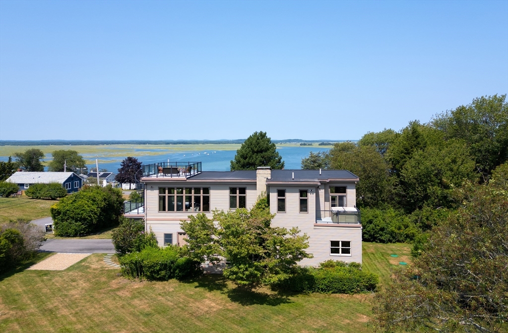 8 Goldfinch Way Ipswich, MA 01938 - Photo 5 of 41 aerial view of a house with a yard and potted plants