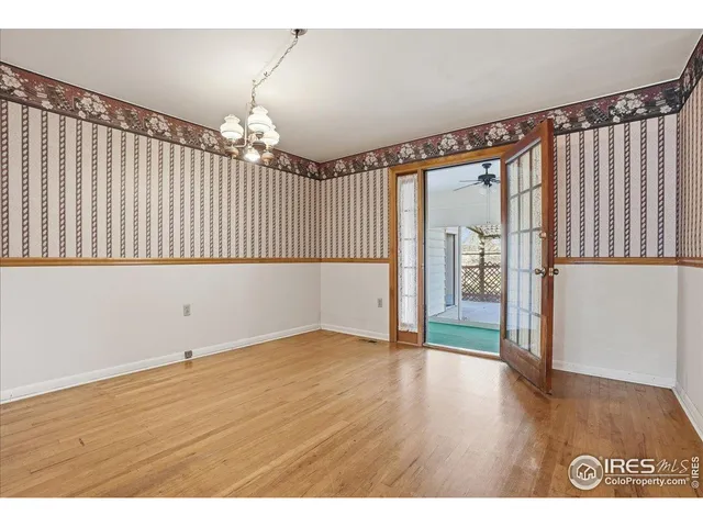 a bathroom with a sink a mirror and a toilet