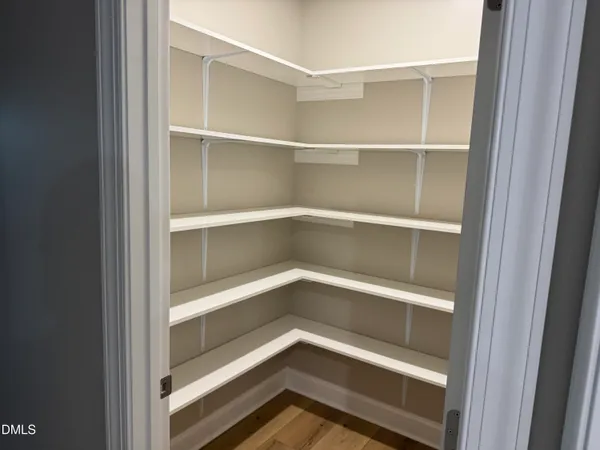 a view of an empty walk in closet