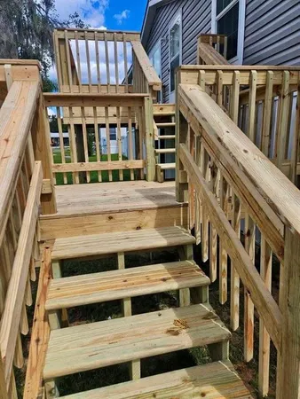 a front view of house with yard having seating