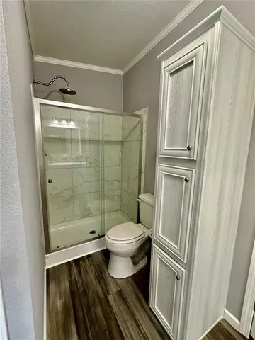 a swimming pool with outdoor seating and yard