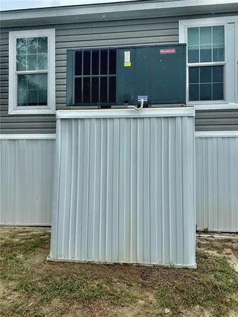 a view of a swimming pool with a yard