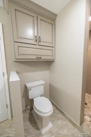 a bathroom with a toilet