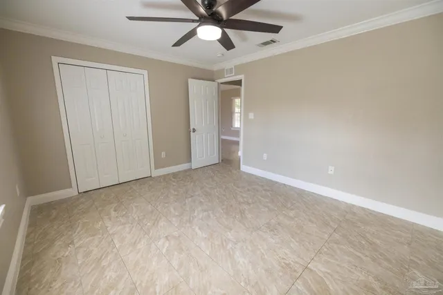 a view of a swimming pool and a yard