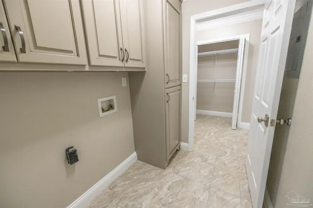 a bathroom with a granite countertop window