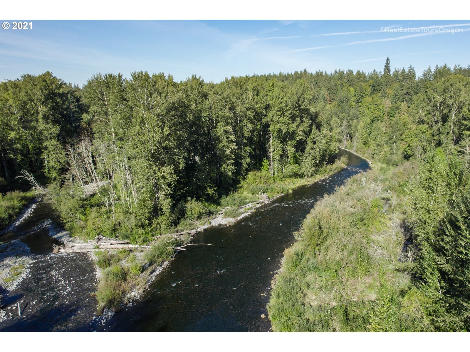 South Dickey Prairie Road, Unit 1176 Molalla, OR 97038 - Photo 2 of 28 a view of a lake with a yard