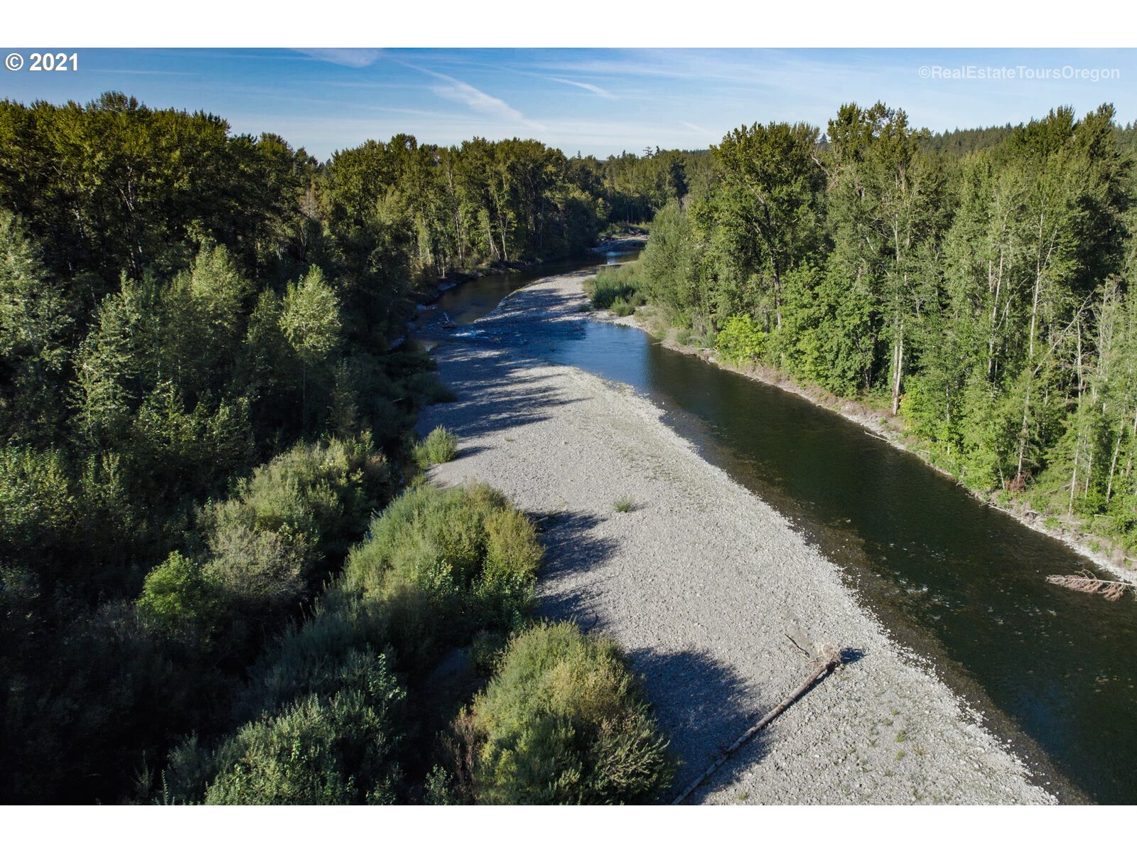 South Dickey Prairie Road, Unit 1176 Molalla, OR 97038 - Photo 18 of 28 a view of a backyard of a house with a lake view