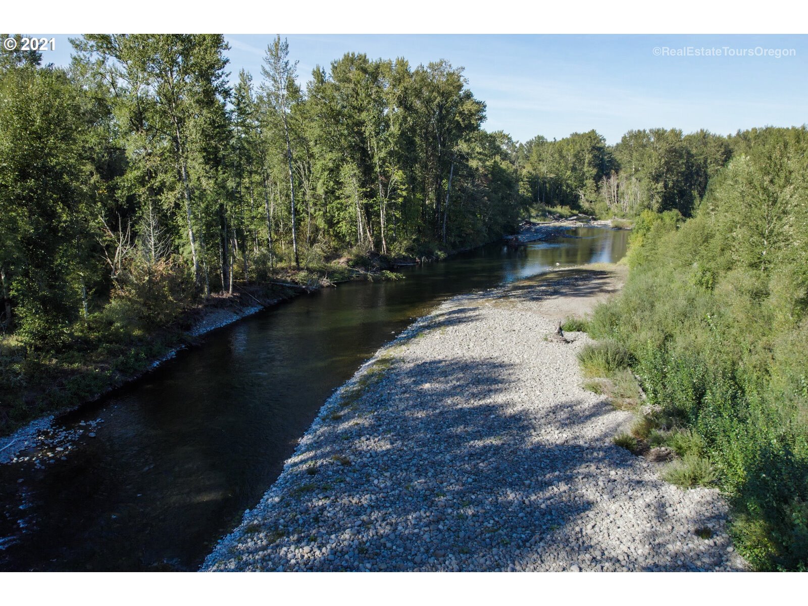 South Dickey Prairie Road, Unit 1176 Molalla, OR 97038 - Photo 3 of 28 a view of a lake with a mountain in the background