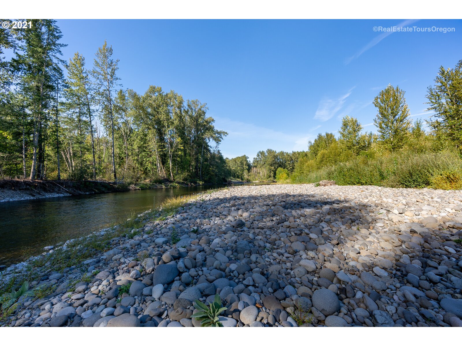 South Dickey Prairie Road, Unit 1176 Molalla, OR 97038 - Photo 10 of 28 a view of a lake with houses