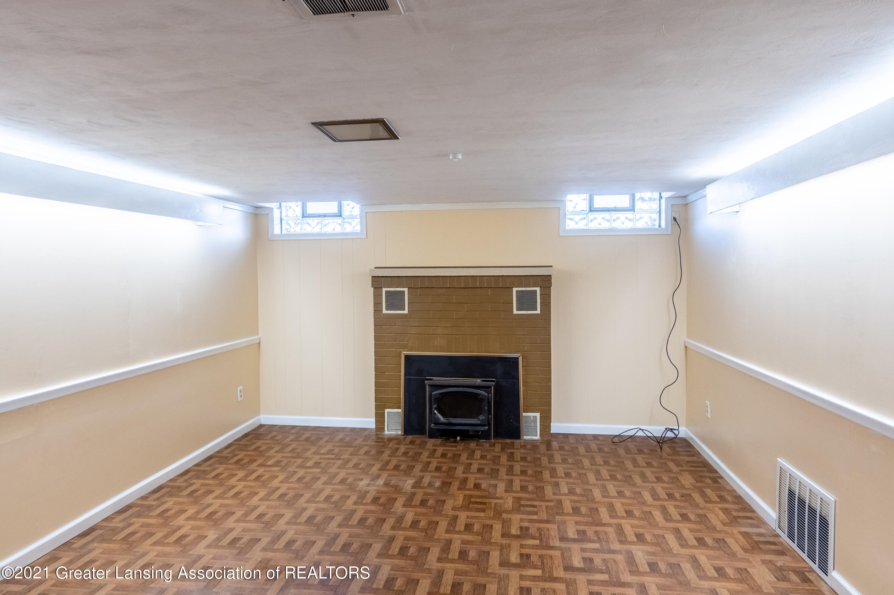 1785 Hamilton Road Okemos, MI 48864 - Photo 30 of 54 Lower Level Fireplace