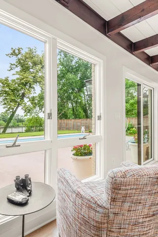 a kitchen with stainless steel appliances granite countertop a sink a stove and a refrigerator