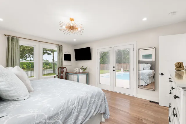 a white bath tub sitting in a bathroom