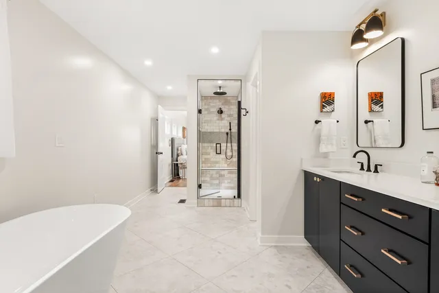 a bedroom with a bed and book shelf