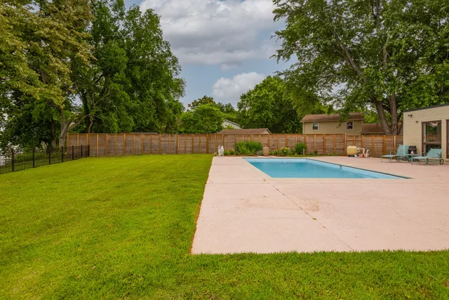 a view of a house with a big yard