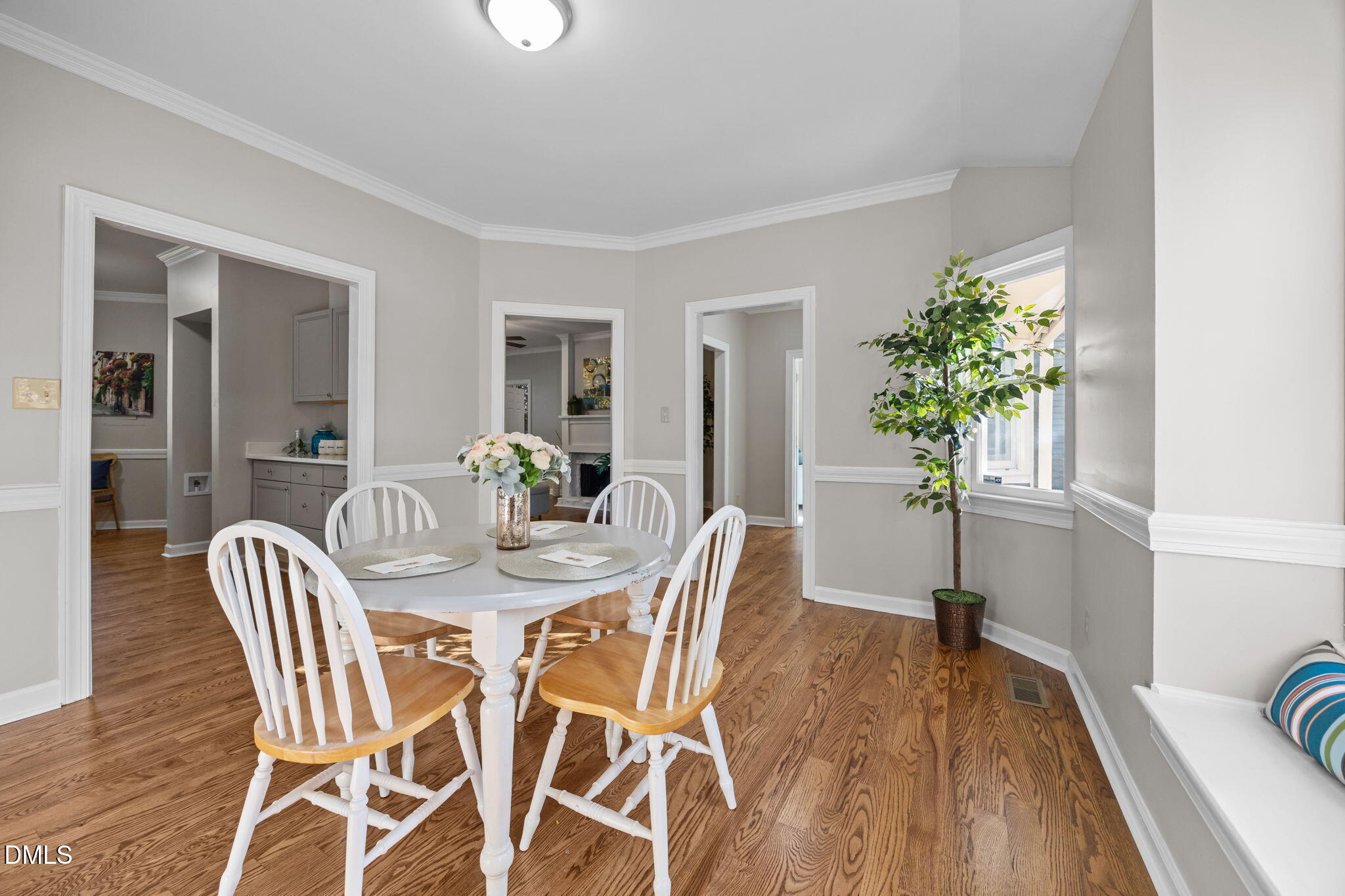 5935 Sentinel Drive Raleigh, NC 27609 - Photo 6 of 53 a view of a dining room with furniture and wooden floor