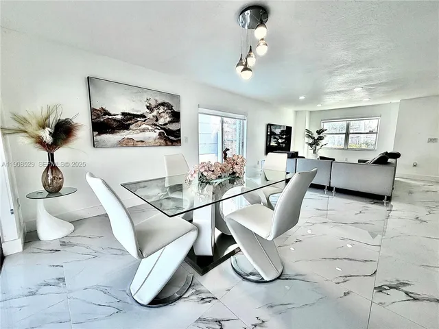 a living room with patio furniture